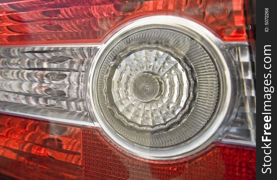 White and red headlights in a close-up