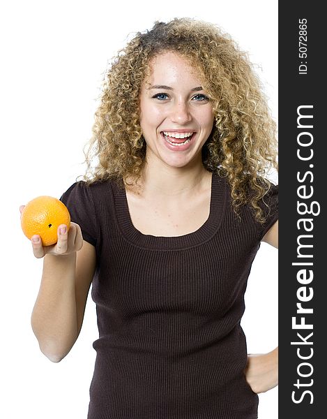 A beautiful young women holding an orange