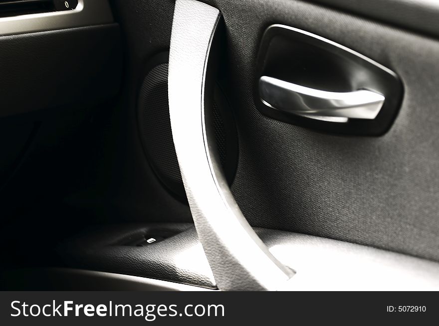 Car seat lever with black and white signs