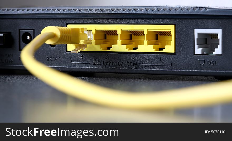 Modem with yellow sockets, macro.