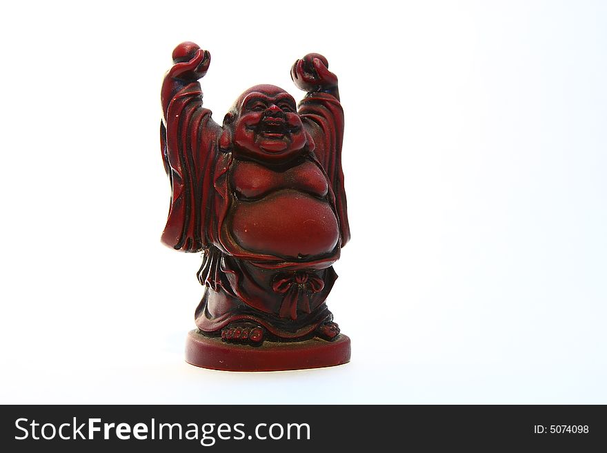 Isolated shot of red buddha statue on white background