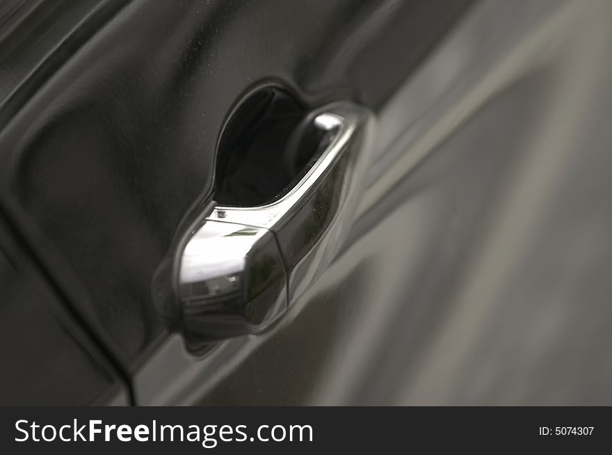 Car handle with black and silver finishing