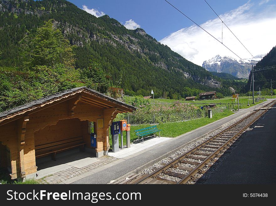 The railway passing among mountains and meadows. The railway passing among mountains and meadows