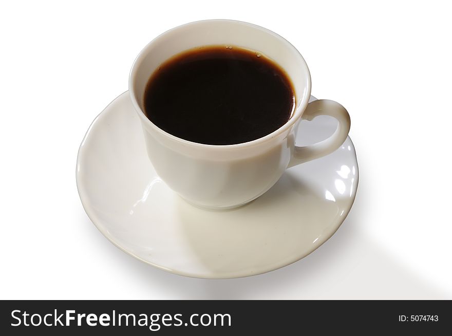 Coffee in a white cup on a saucer on a white background