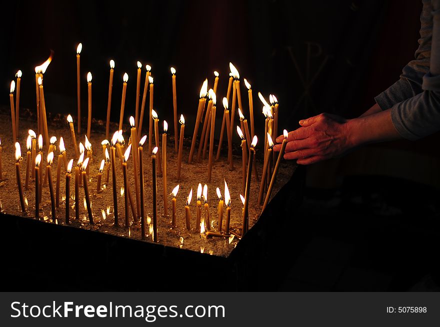 A view with candles into a church