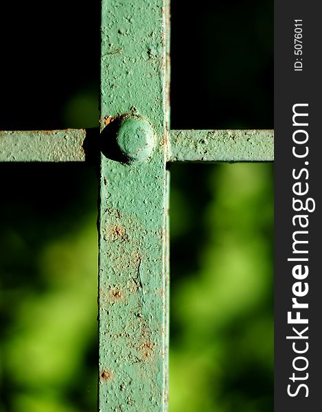 Iron fence painted in green details. Iron fence painted in green details