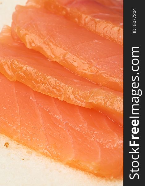 Salted salmon slices on fresh bread