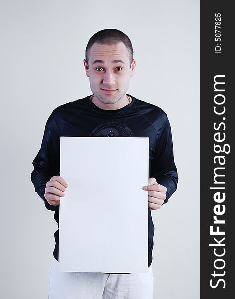 Man with placard at white background