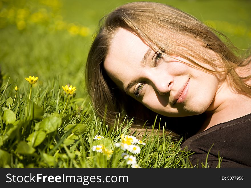 Woman Resting In Meadow