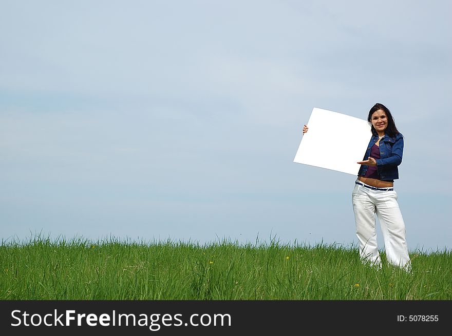 Attractive brunette woman on sky background. Attractive brunette woman on sky background