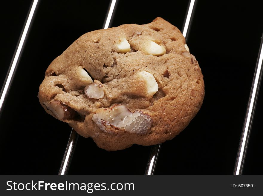 Cookie Biscuit With White Chocolate And Nuts On Oven Rack