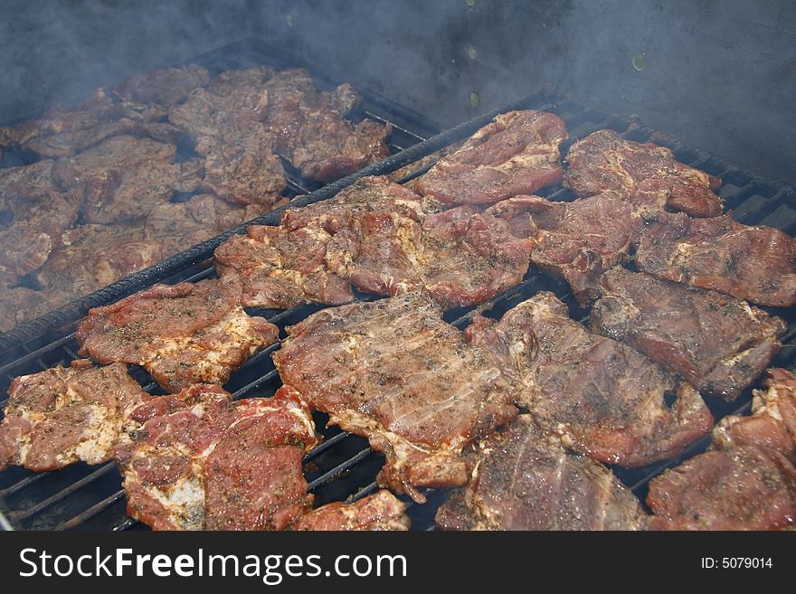 Close up of grilled meat and sausage, outdoor. Close up of grilled meat and sausage, outdoor