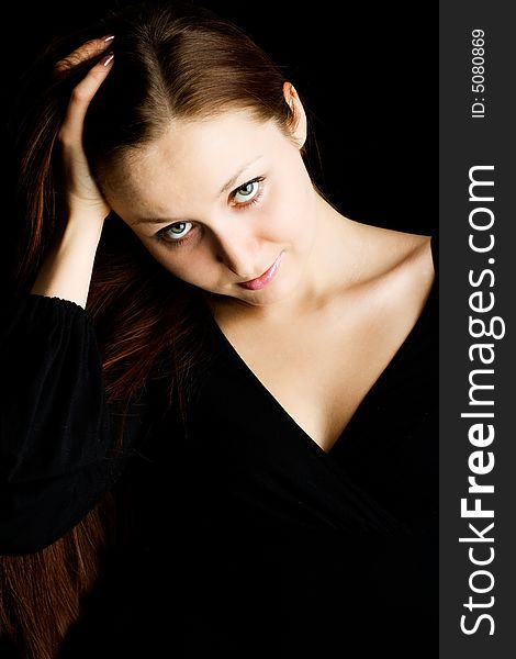 Looking woman against a black background