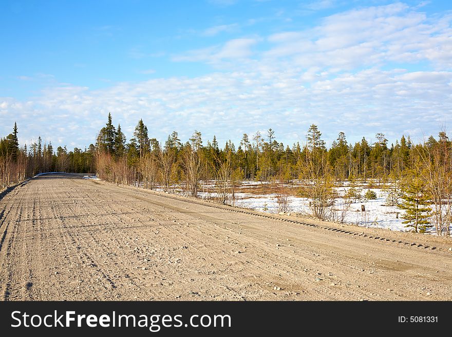 Photo Karelian forest roads spring. Photo Karelian forest roads spring.