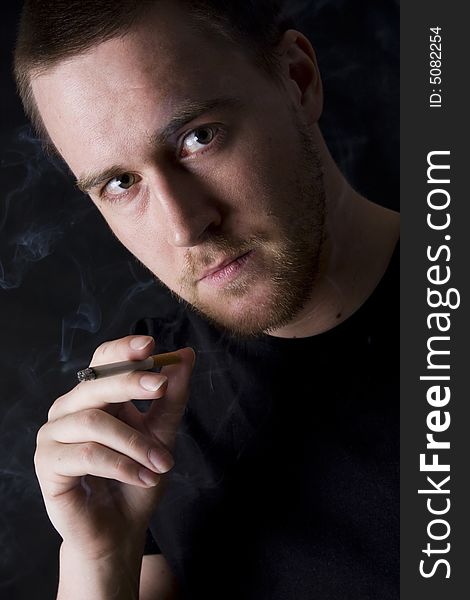 Man Smoking A Cigarette