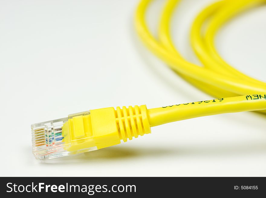 Yellow Computer Network Cable on White background