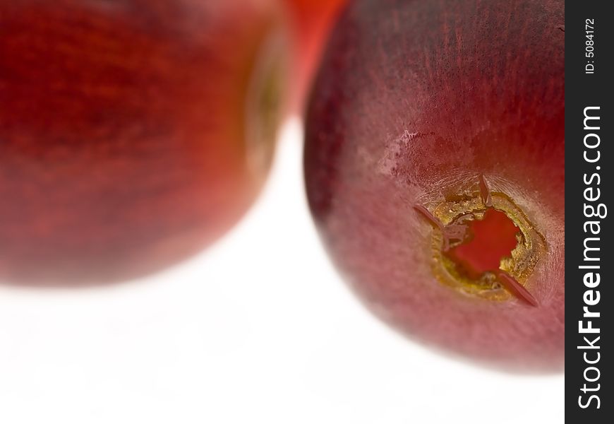 Red grapes macro isolated against white background. Red grapes macro isolated against white background