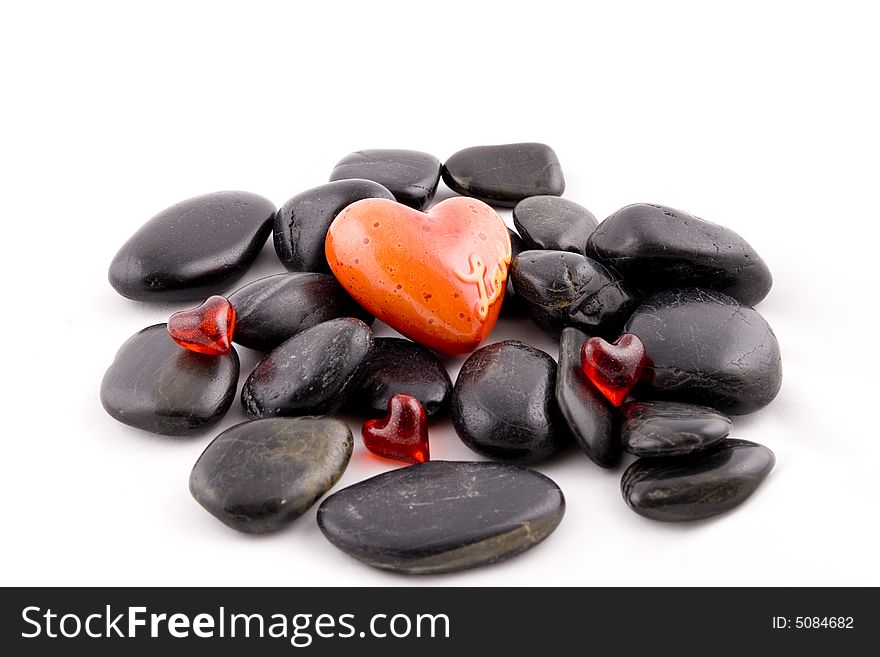Red heart on black stones backrdound. Red heart on black stones backrdound