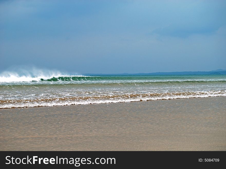 Stormy sea on a moody cloudy day with spray coming off the waves. Stormy sea on a moody cloudy day with spray coming off the waves