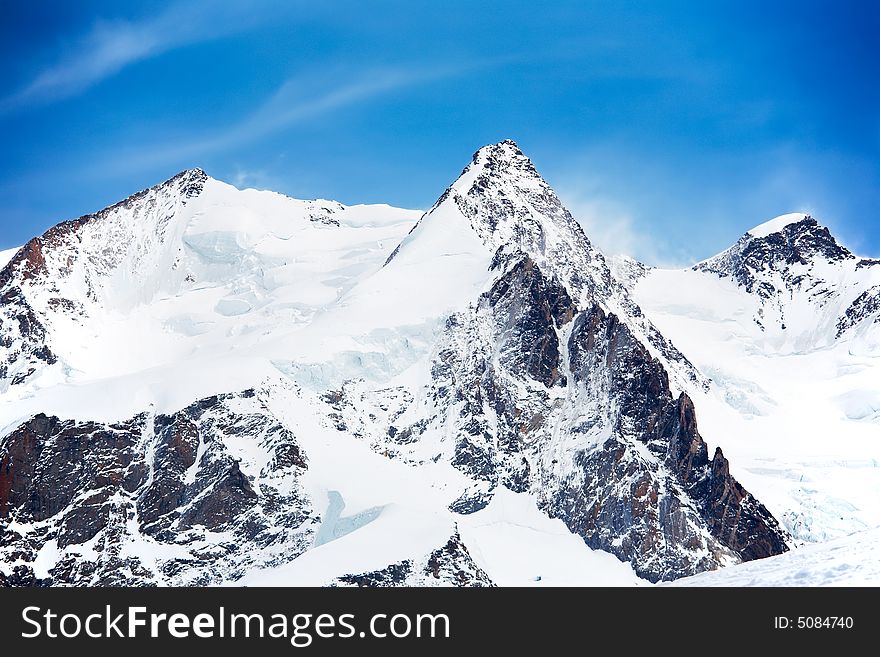 The highest peaks of Monte Rosa (4664 mt): from left to right: Nordend, Dufour, Parrot. Zermatt, Swiss, Europe. The highest peaks of Monte Rosa (4664 mt): from left to right: Nordend, Dufour, Parrot. Zermatt, Swiss, Europe.