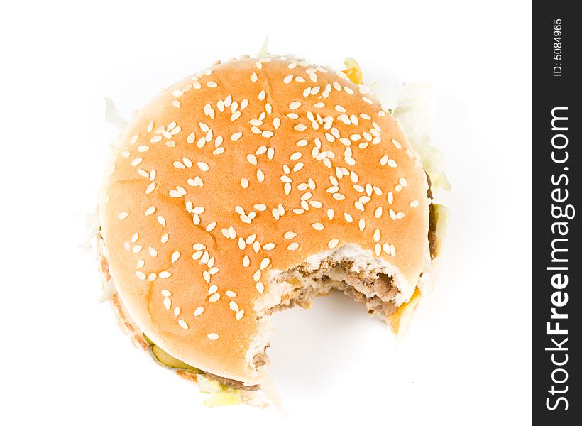 Bread with fried meat, cheese, onion, lettuce and measuring tape isolated on a  white background. Bread with fried meat, cheese, onion, lettuce and measuring tape isolated on a  white background.