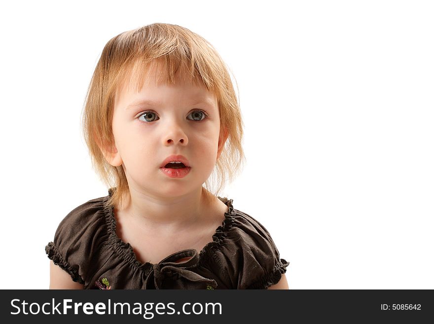 Little beauty girl terrifically wonder and open her mouth. She seeing smb interesting from the right of photographer.