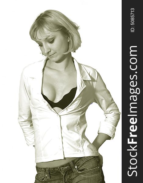 An friendly blond girl in jeans and white jacket standing in an studio 
for white background and shooing her black bra. An friendly blond girl in jeans and white jacket standing in an studio 
for white background and shooing her black bra.