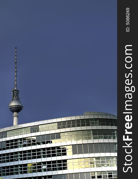 Modern building in berlin with the famous television tower in the background. Modern building in berlin with the famous television tower in the background.
