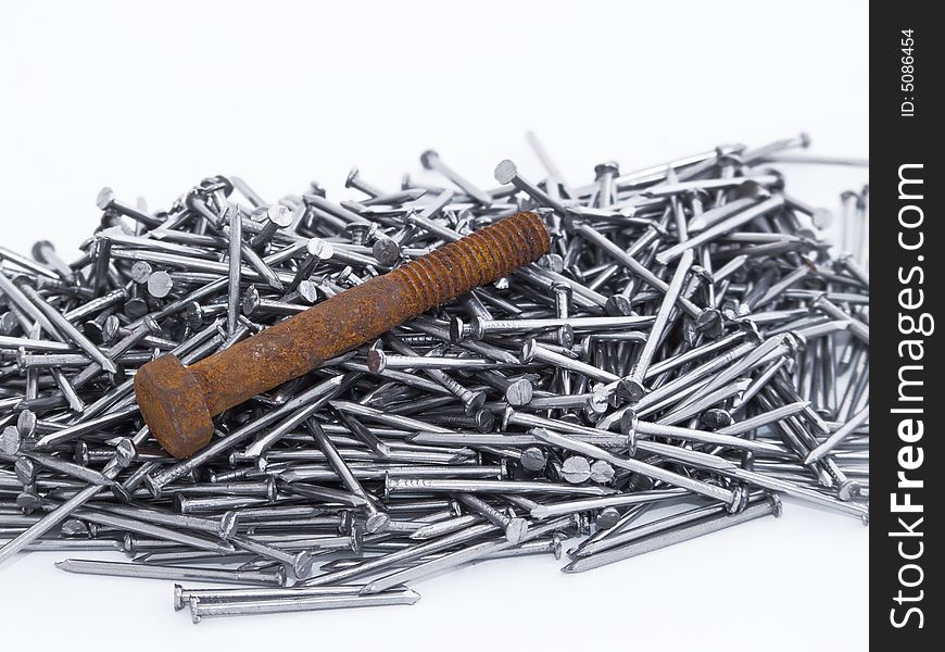 Rusty bolt and metal nails. Rusty bolt and metal nails