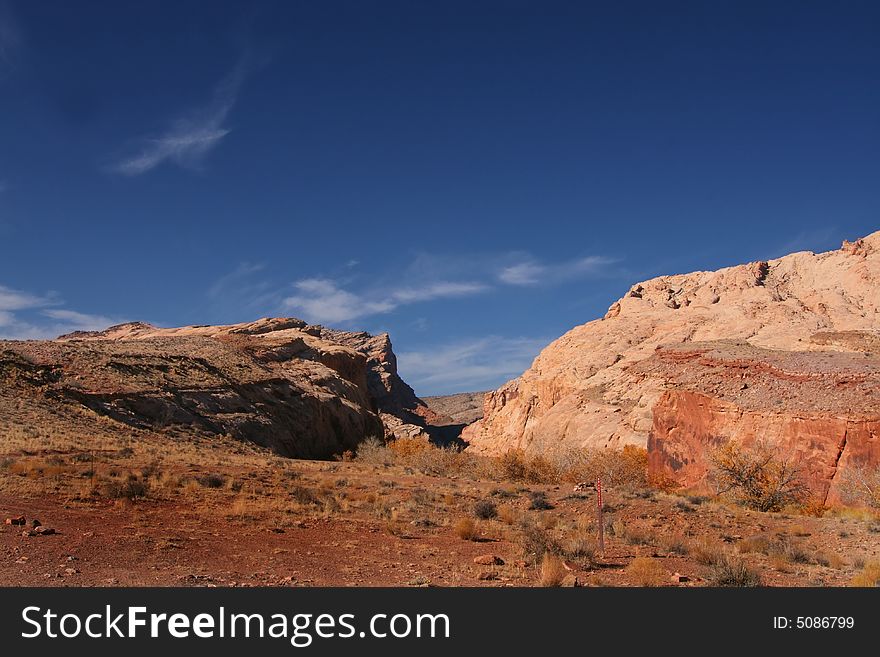 View of the red rock formations in San Rafael Swell with blue skyï¿½s. View of the red rock formations in San Rafael Swell with blue skyï¿½s