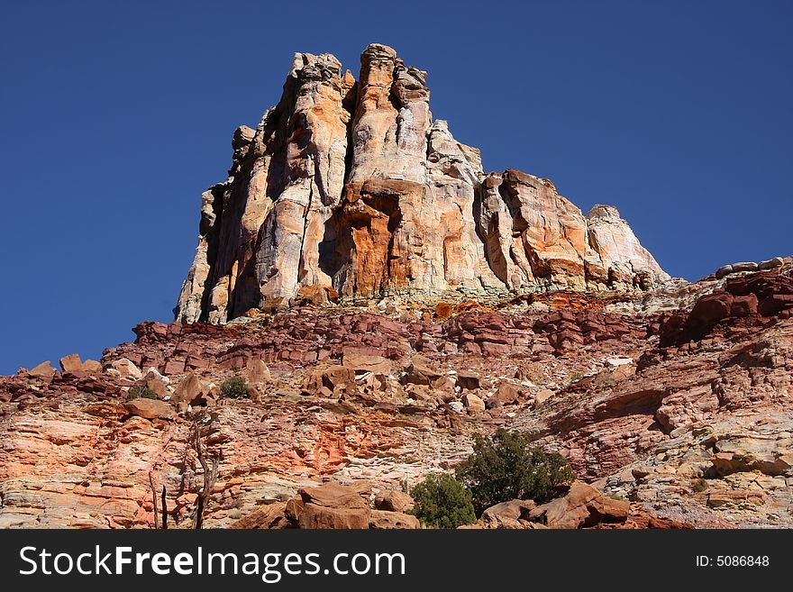 View of the red rock formations in San Rafael Swell with blue skyï¿½s. View of the red rock formations in San Rafael Swell with blue skyï¿½s