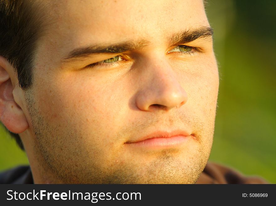 Headshot of a young Caucasian male. Headshot of a young Caucasian male.