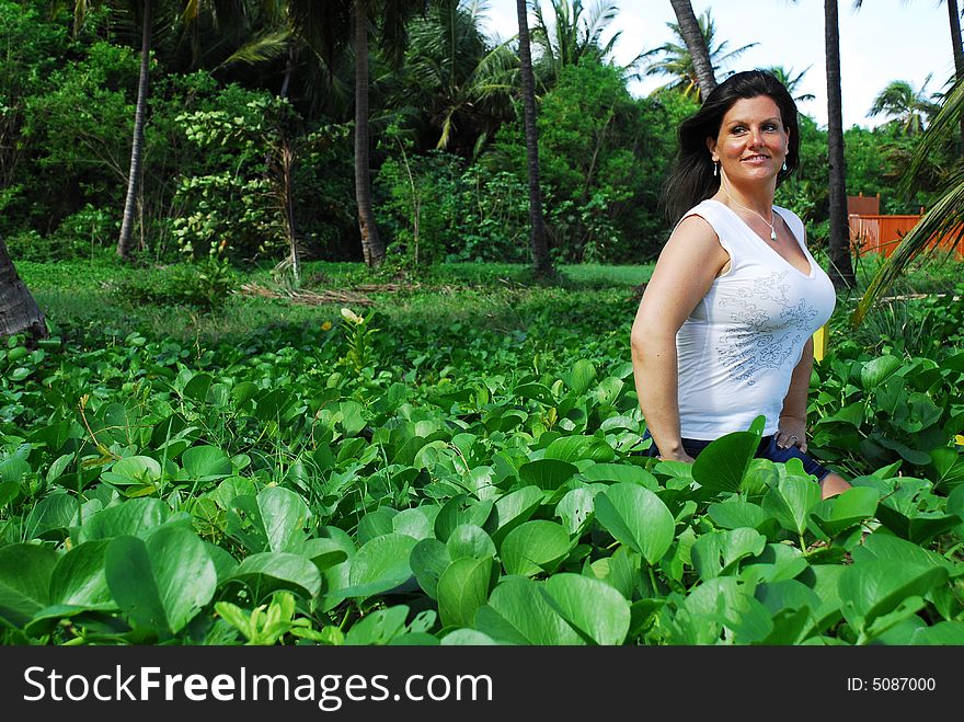 Beautiful Woman in Tropical Forrest