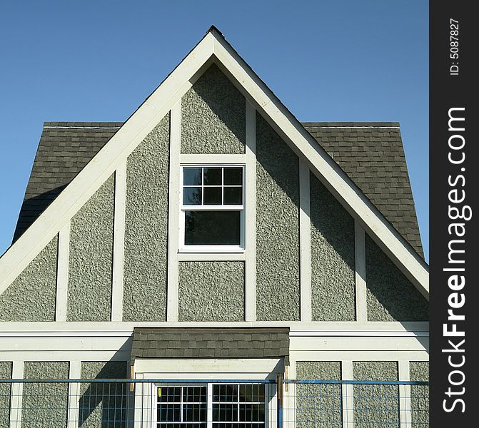 Stucco gable detail on a new home under construction. Stucco gable detail on a new home under construction