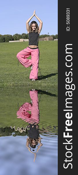 Woman in meditation at the park