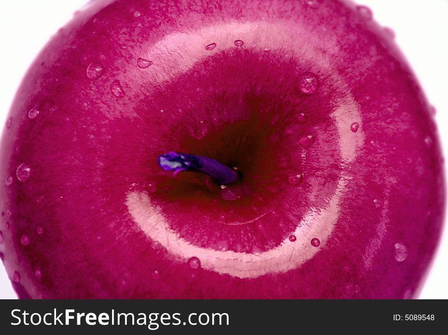 An image of a fresh pink apple