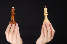 Two Hands With Two Chesspieces Stock Images Two Hands With Two Chesspieces Stock Images