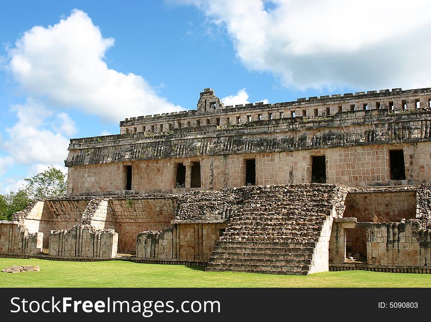 Maya ruins with antique columns over blue sky. Maya ruins with antique columns over blue sky