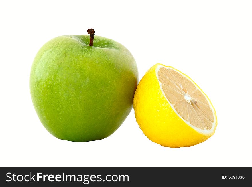 Green apple and acid-yellow lemon on isolated background. Green apple and acid-yellow lemon on isolated background.