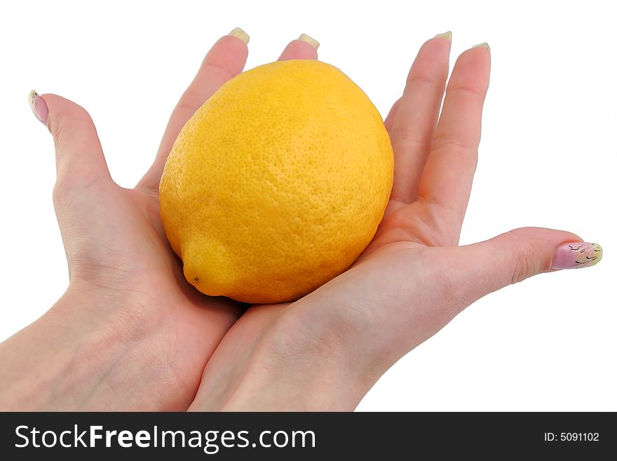 Lemon and woman hands on a white background. Lemon and woman hands on a white background