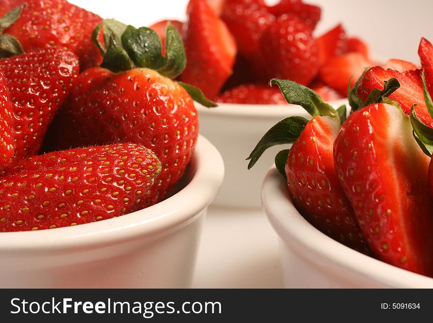 Fresh red strawberry in white bowl