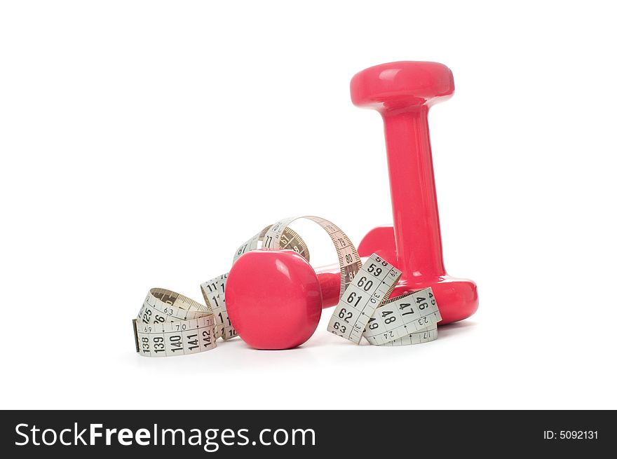 Dumbells and tape measure on a white background