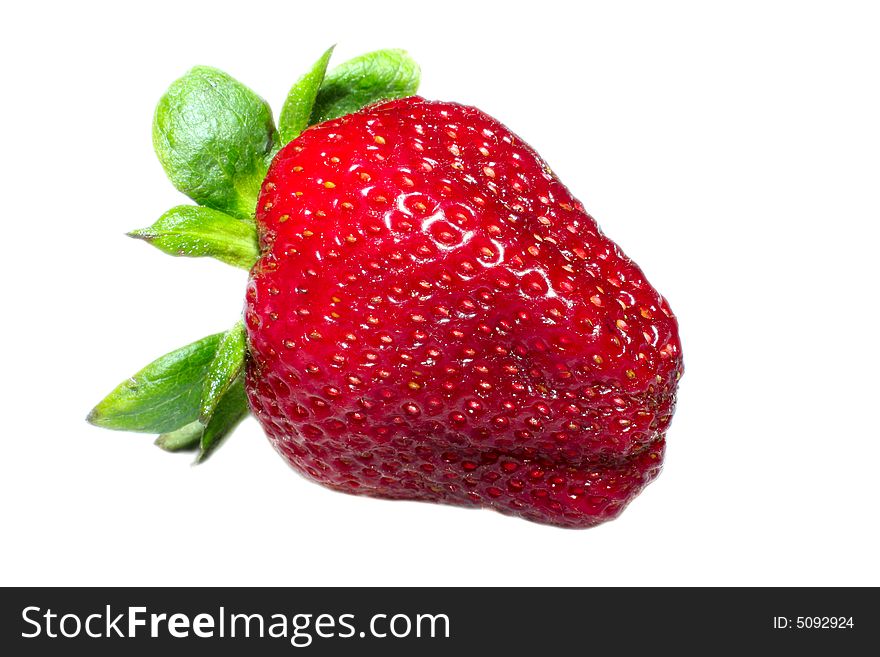 Close up of a strawberry. Isolated over white background