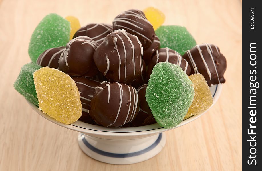 Chocolate and fruit candy in vase