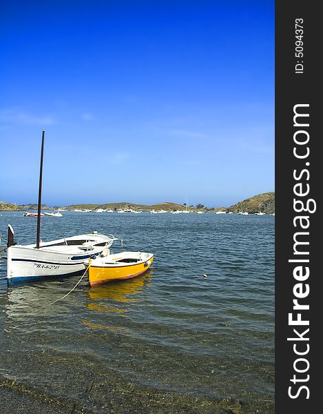 Fishing boats lying on the beach of a bay