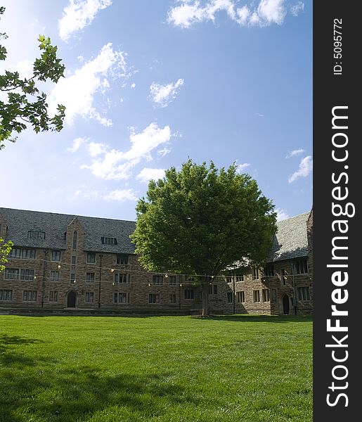 Grass field, with gothic style architecture on a spring afternoon. Grass field, with gothic style architecture on a spring afternoon.