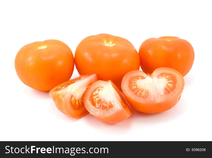 Red tomatoes isolated on white