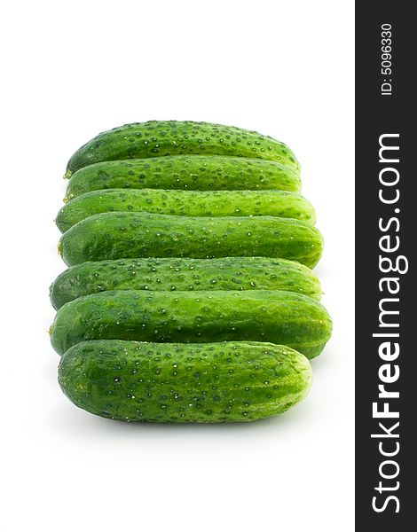 Green cucumbers isolated on white. Green cucumbers isolated on white