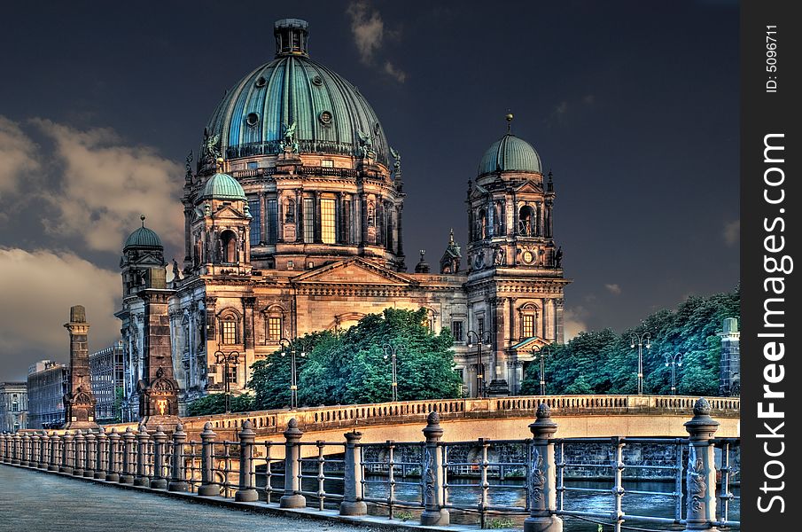 The famous dome in berlin next to the river spree. The famous dome in berlin next to the river spree
