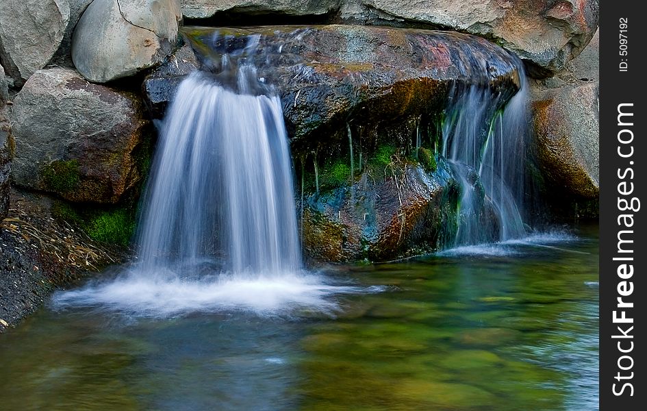 Silky smooth waterfall at the park. Silky smooth waterfall at the park